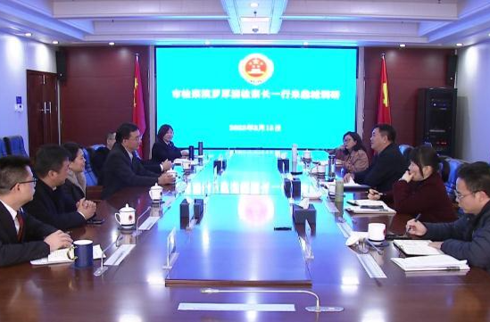 朱金平与市人民检察院检察长罗厚清座谈交流