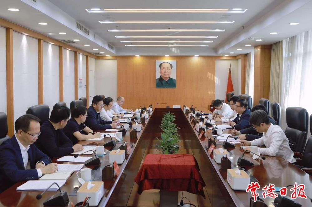 罗毅君与华能湖南分公司白玉峰一行座谈