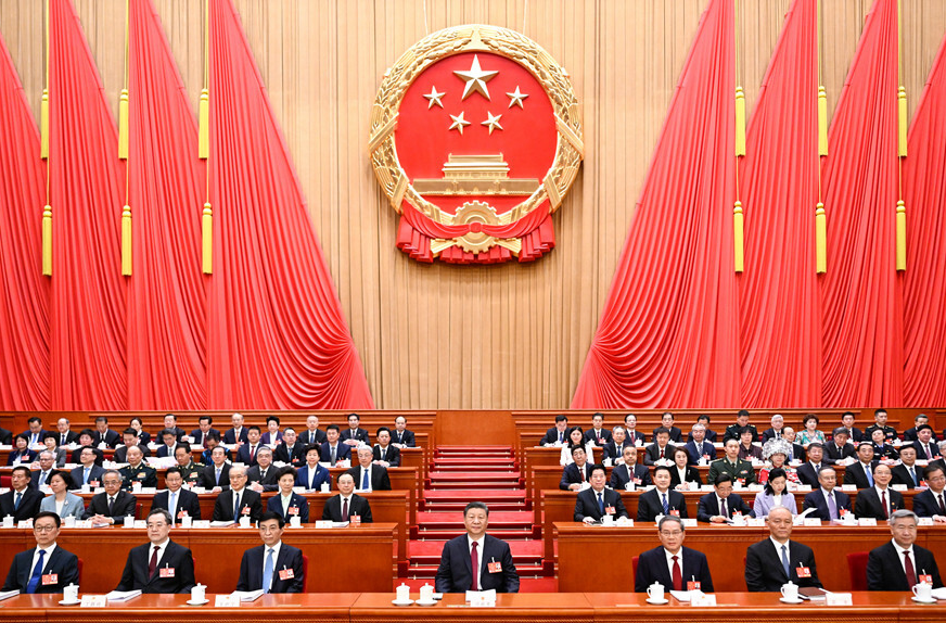 十四届全国人大三次会议在京开幕 习近平等在主席台就座